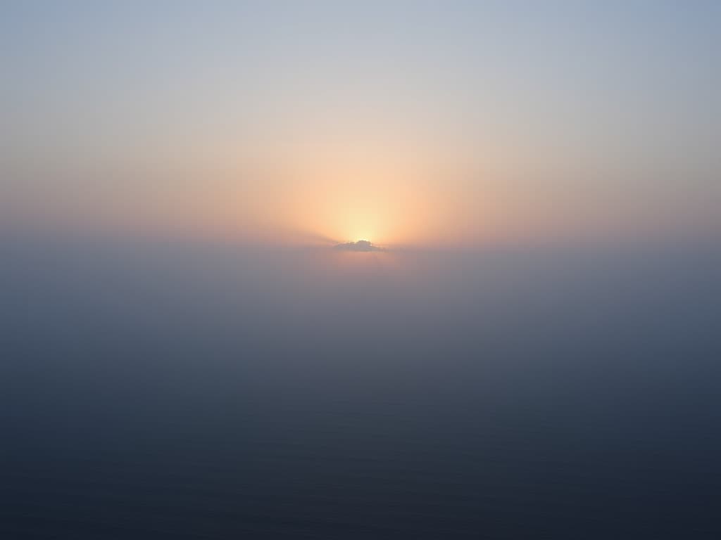 Calm coastal horizon — the steady surface an owner reaches the team from